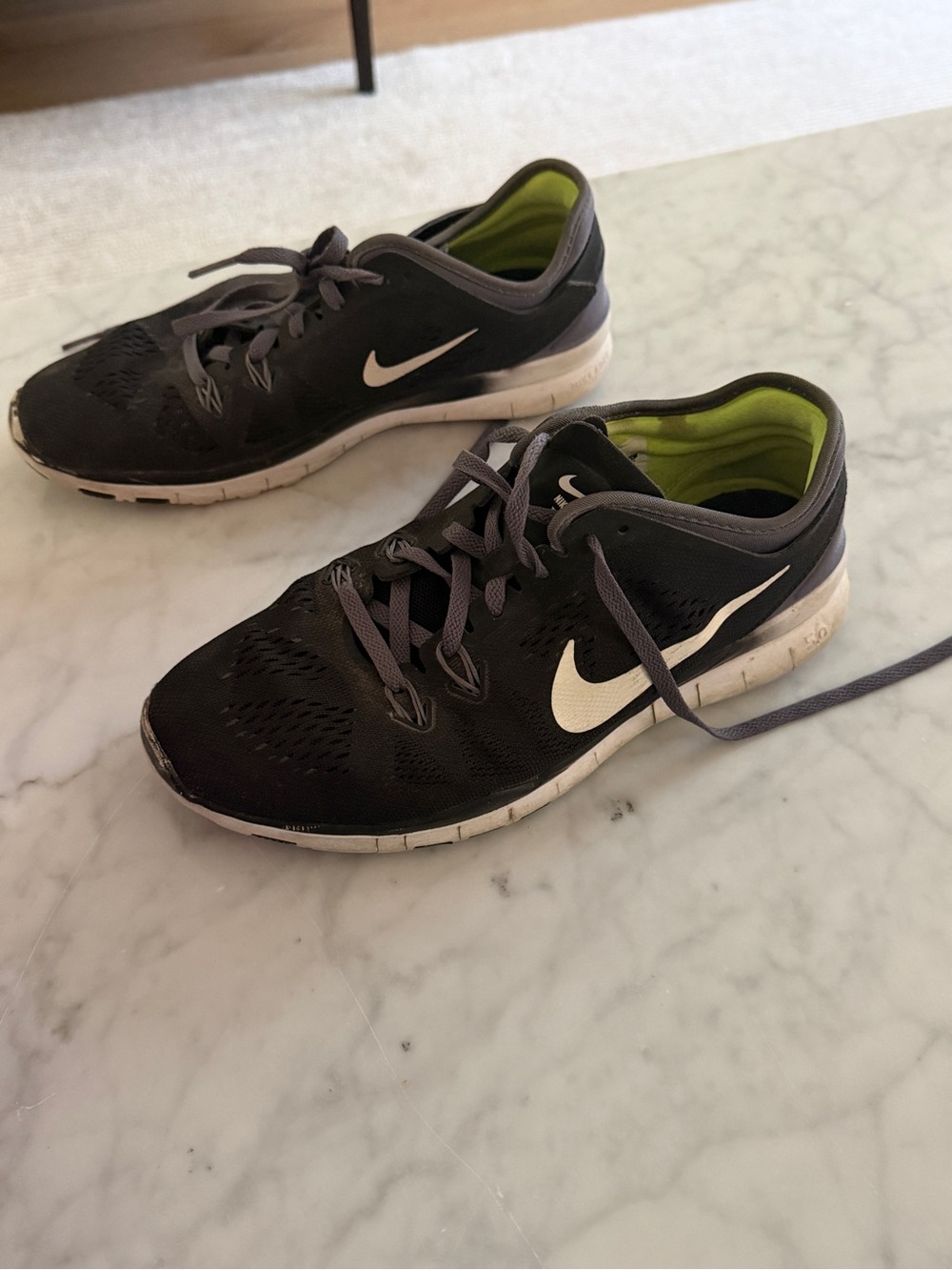 Nike Women’s Black Running Sneakers with White Swoosh